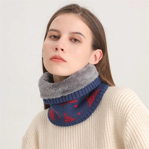 Close-up of knit neck warmer with snowflake pattern and thick grey fleece lining