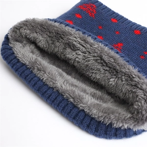 Detail of winter knit neck warmer featuring thick gray fleece lining and red star pattern