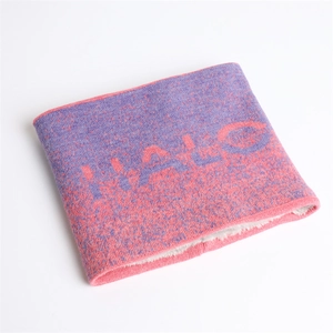 Detail view of the thick fleece lining and HALO knit pattern on the purple winter snood