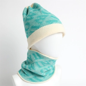 Winter knit hat and neck warmer set in blue and cream wave pattern with soft fleece lining