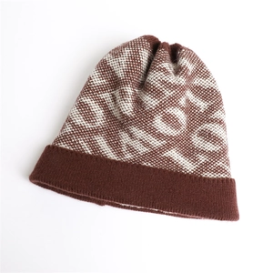 Women's winter warm knitted beanie hat with letter jacquard pattern and fleece lining