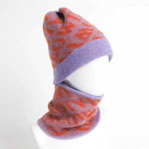 Detailed knit texture of purple and orange jacquard warm winter hat and neck warmer set
