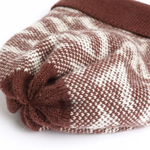 Close-up of the knitted beanie crown featuring premium brown and beige wave patterns