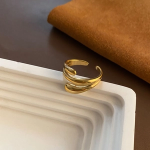 Modern triple-layer wrap-around gold titanium steel ring with liquid metal design