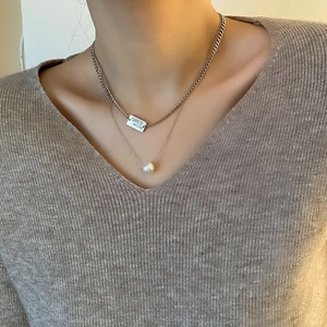 Double-layered titanium steel necklace with pearl pendant and engraved GIRLS WELOVE tag