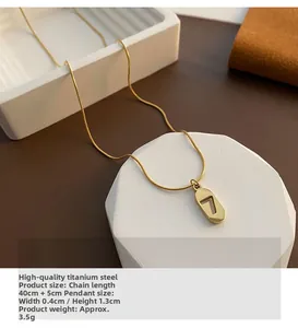 Detail of gold titanium steel lucky number 7 necklace with 40cm plus 5cm adjustable chain