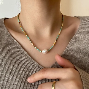 Bohemian choker with turquoise beads, natural stones and a white baroque pearl pendant