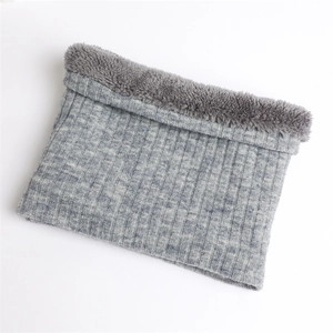 Close-up of grey ribbed knit neck warmer with thick soft fleece lining for winter warmth