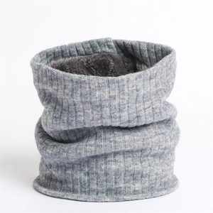 Detail of grey ribbed knit neck warmer with thick grey faux fur fleece lining for winter