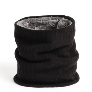 Close-up of black knitted winter neck warmer showing thick grey fleece lining detail