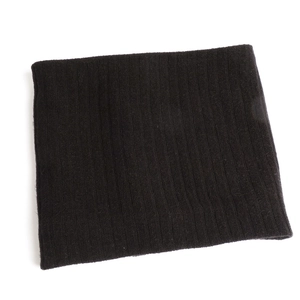 Detailed close-up of black ribbed knit winter neck warmer with elastic stripe pattern
