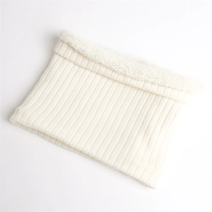 Detailed view of cream white knit scarf with thick fleece lining for winter warmth