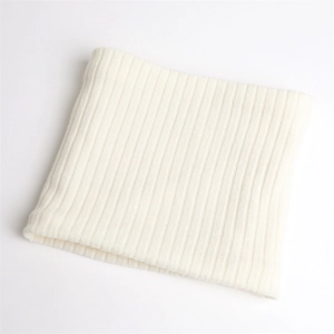 Detail of white ribbed knit winter neck warmer showing soft vertical striped texture