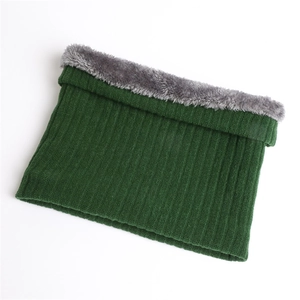 Detailed close-up of dark green ribbed knit snood with thick grey faux fur fleece lining