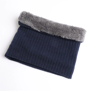 Detail of navy ribbed knit neck warmer with thick grey fleece lining for winter warmth