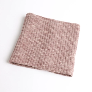 Detail of soft ribbed knit texture on thermal winter neck warmer with fuzzy yarn