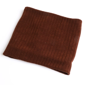 Detailed view of dark brown ribbed knit neck warmer with elastic stripe texture