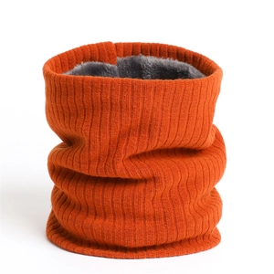 Winter thermal knit neck warmer with orange ribbed exterior and thick grey fleece lining