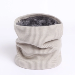 Detail of oatmeal knit neck warmer with thick faux fur lining for winter warmth