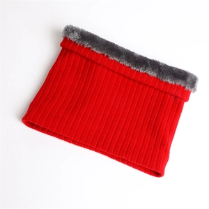 Close-up of red knit neck warmer featuring a thick dark grey faux fur lining for winter
