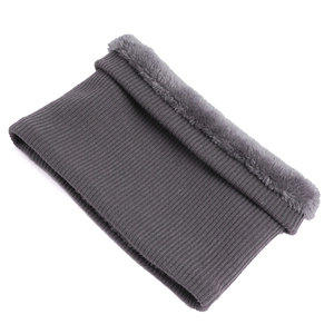 Close-up of grey knitted neck warmer with thick faux fur lining for winter warmth
