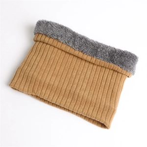 Detail of winter neck warmer showing camel ribbed knit and thick grey fleece lining