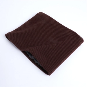 Detail of dark brown knitted snood showing thick grey fleece lining and ribbed texture