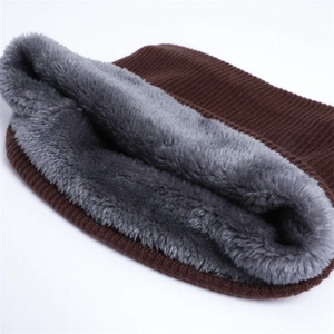 Detail of coffee brown knit neck warmer with thick soft grey faux fur lining inside