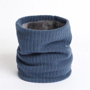 Close-up of blue ribbed knit neck warmer with thick grey fleece lining for winter warmth