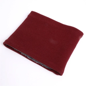 Close-up of wine red ribbed knit neck warmer with thick grey faux fleece lining for winter