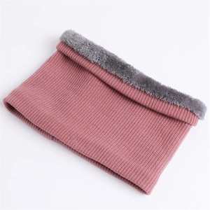 Detail of pink ribbed knit neck warmer with thick grey faux fur lining for winter