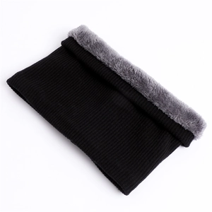Close-up of black knitted winter neck warmer showing thick grey faux fur lining detail