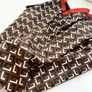 Brown silk scarf with L-letter print and red contrast borders in 90cm square size
