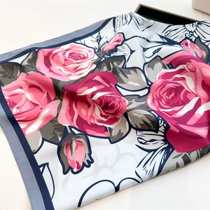 90cm square silk scarf featuring large pink rose floral print and navy blue rolled edges
