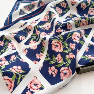 French style floral silk scarf with pink flowers on navy blue and white geometric background