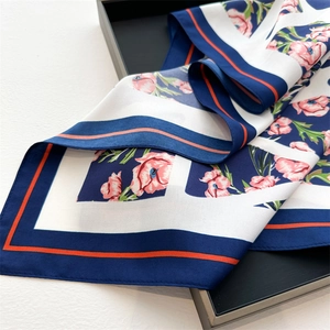Elegant floral silk square scarf with pink flower print and navy border in gift box