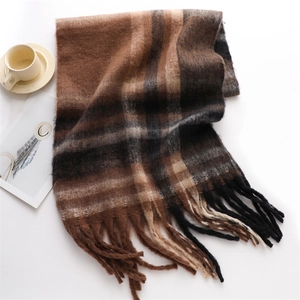 Winter thick faux cashmere scarf with brown plaid pattern and tassels on white background
