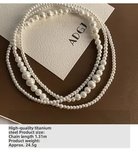 Détail d'un collier de perles multicouche de 1,31m en acier titane avec dimensions