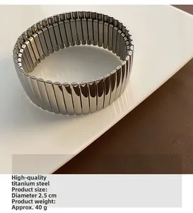 Detail of adjustable silver titanium steel bracelet showing 2.5cm diameter and 40g weight