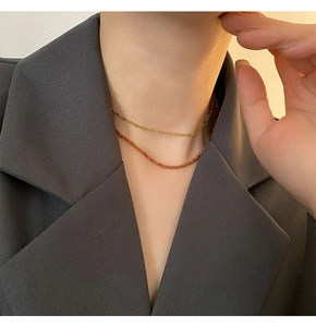 Layered natural orange garnet bead necklace set with a golden water wave metal chain