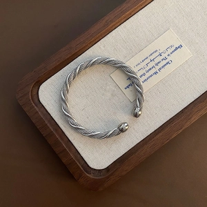 Twisted stainless steel cable cuff bracelet with round ball end tips in silver finish