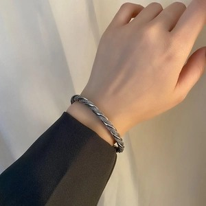 Unisex twisted rope silver cuff bracelet with vintage metal texture in C-shape design