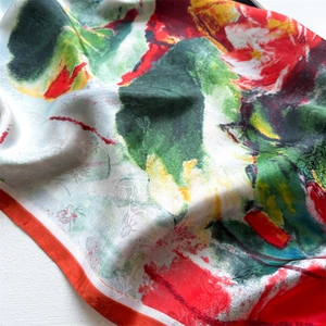 Detailed texture of oil painting style silk scarf with lotus print and jacquard fabric