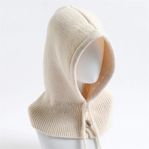 Beige knitted balaclava with drawstring and button detail on a minimalist model