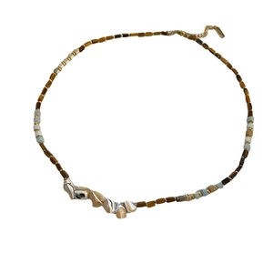 Handmade beaded bohemian necklace with shell pendants and gold lobster clasp closure