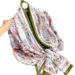 Elegant floral silk scarf with olive green border and bird print for sun protection