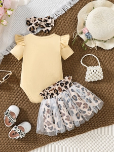 Infant girl summer set featuring yellow ruffle romper, leopard tutu skirt and matching headband