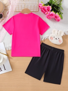 Kids summer fashion set featuring a neon pink t-shirt and black shorts with cat design