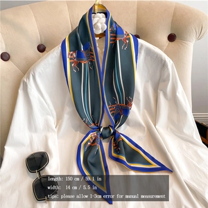 Detail showing dimensions of the equestrian print silk scarf on a white shirt
