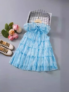 Robe sans manches bleu clair à volants pour filles avec un nœud décoratif au col